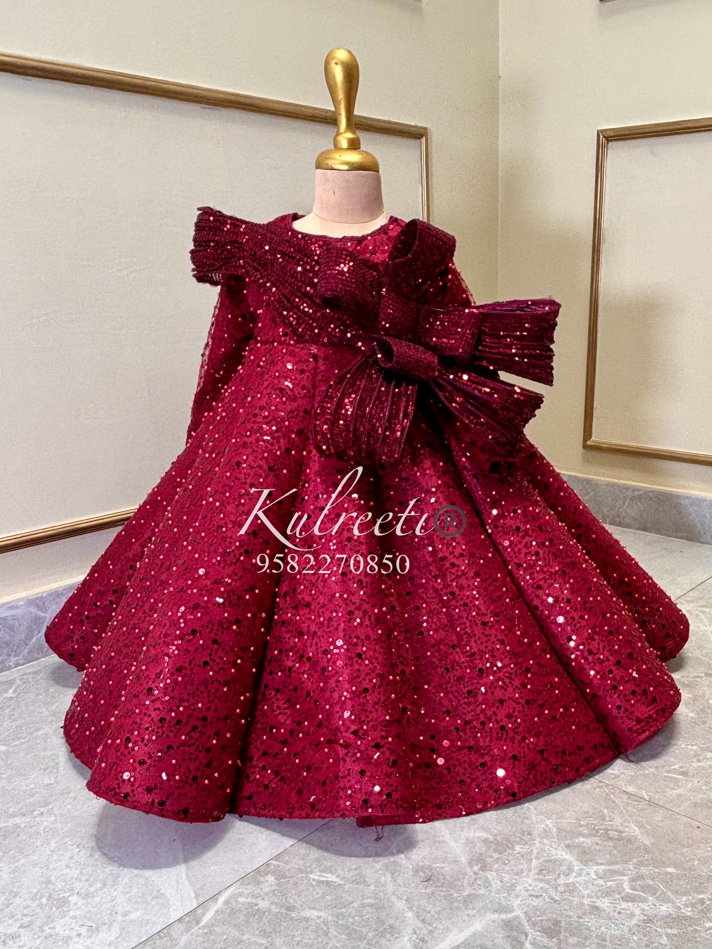 Maroon pearl sequin ball panel gown withhand work