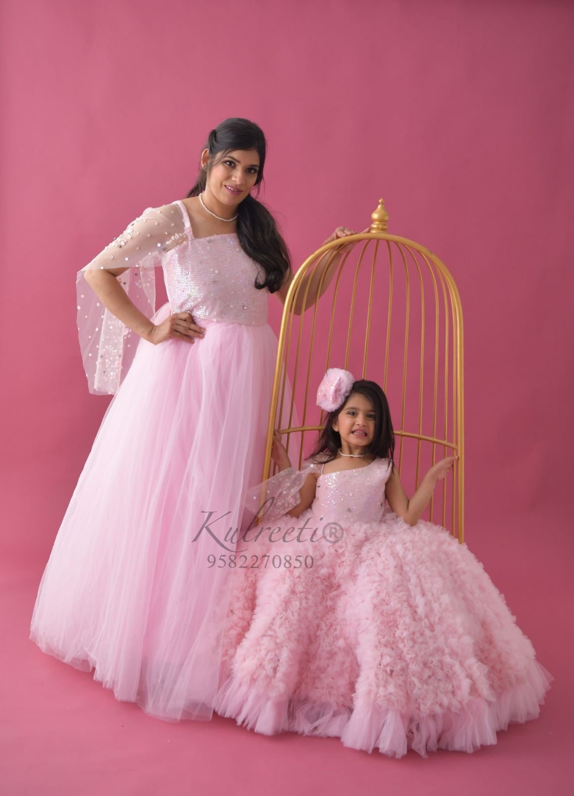 Pink waterfall frill gown with sequin top and hand embroidery drape