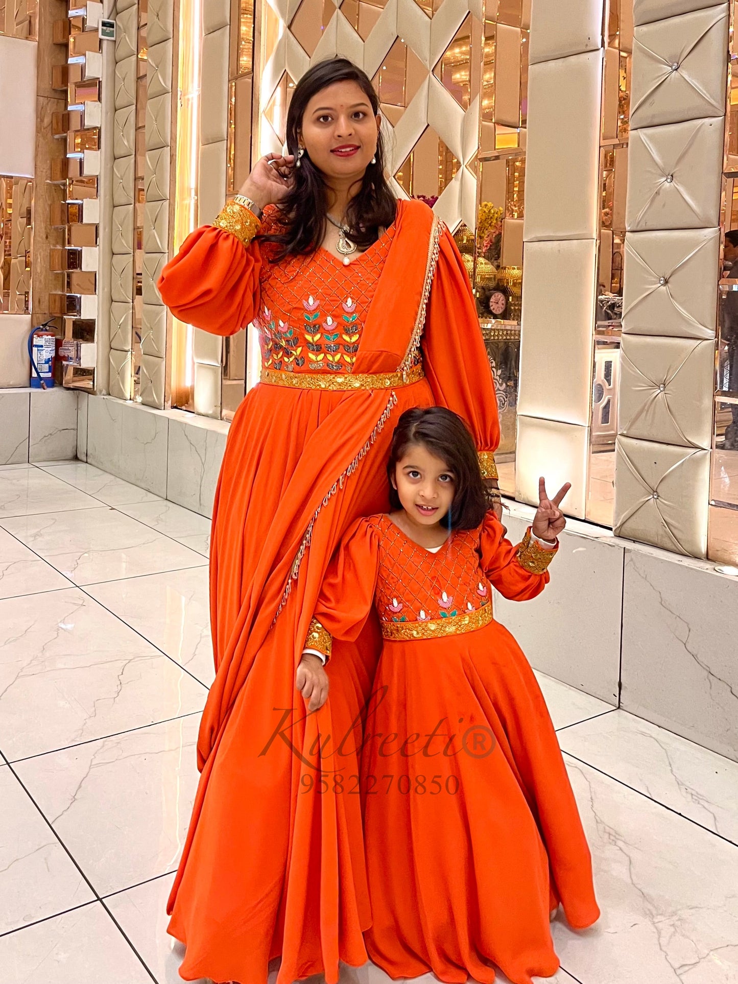 Orange hand embroidered ethnic wear with georgette fabric