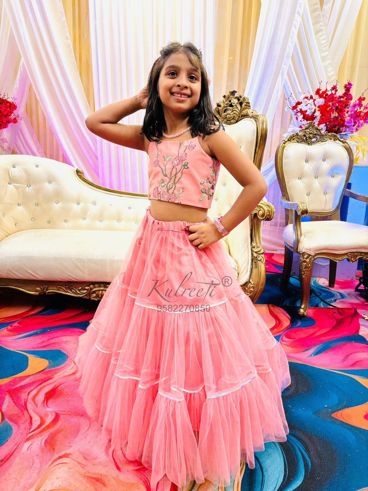 Onion pink net frill embroidered blouse with unique style lehenga