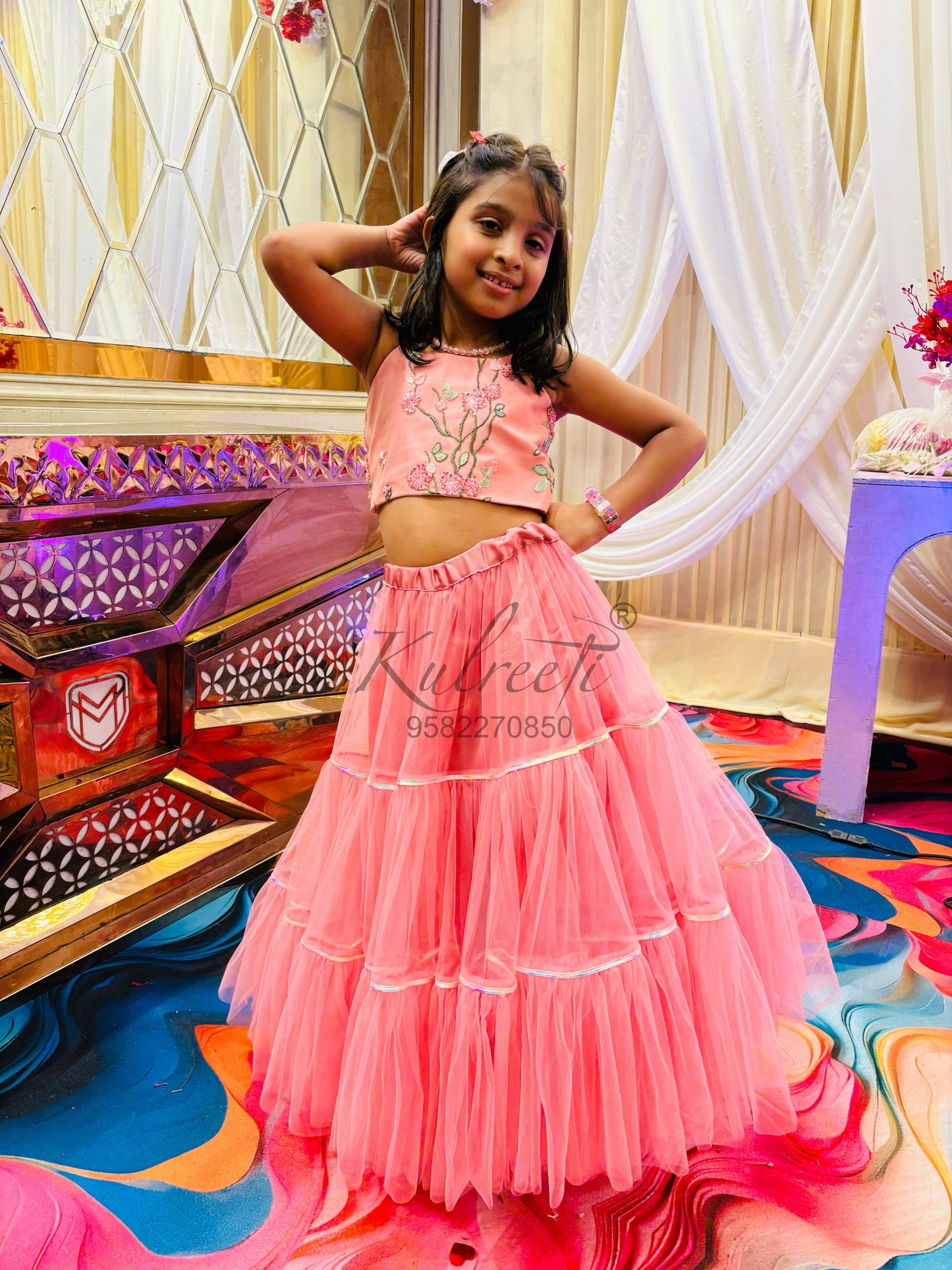 Onion pink net frill embroidered blouse with unique style lehenga