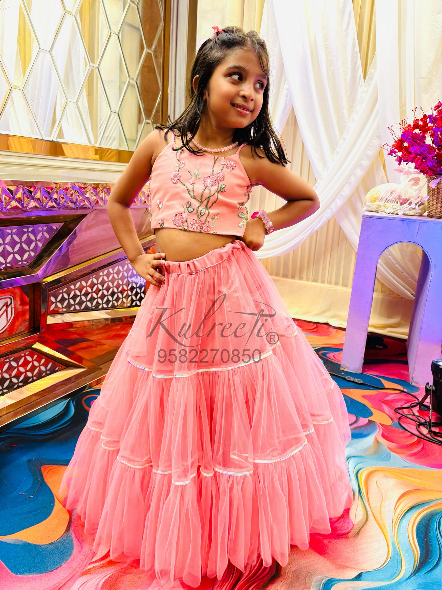 Onion pink net frill embroidered blouse with unique style lehenga
