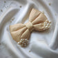 SATIN WITH PEARL DETAILING HAIR BOW ACCESSORY