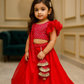 Red organza lehenga with Abhla work Top