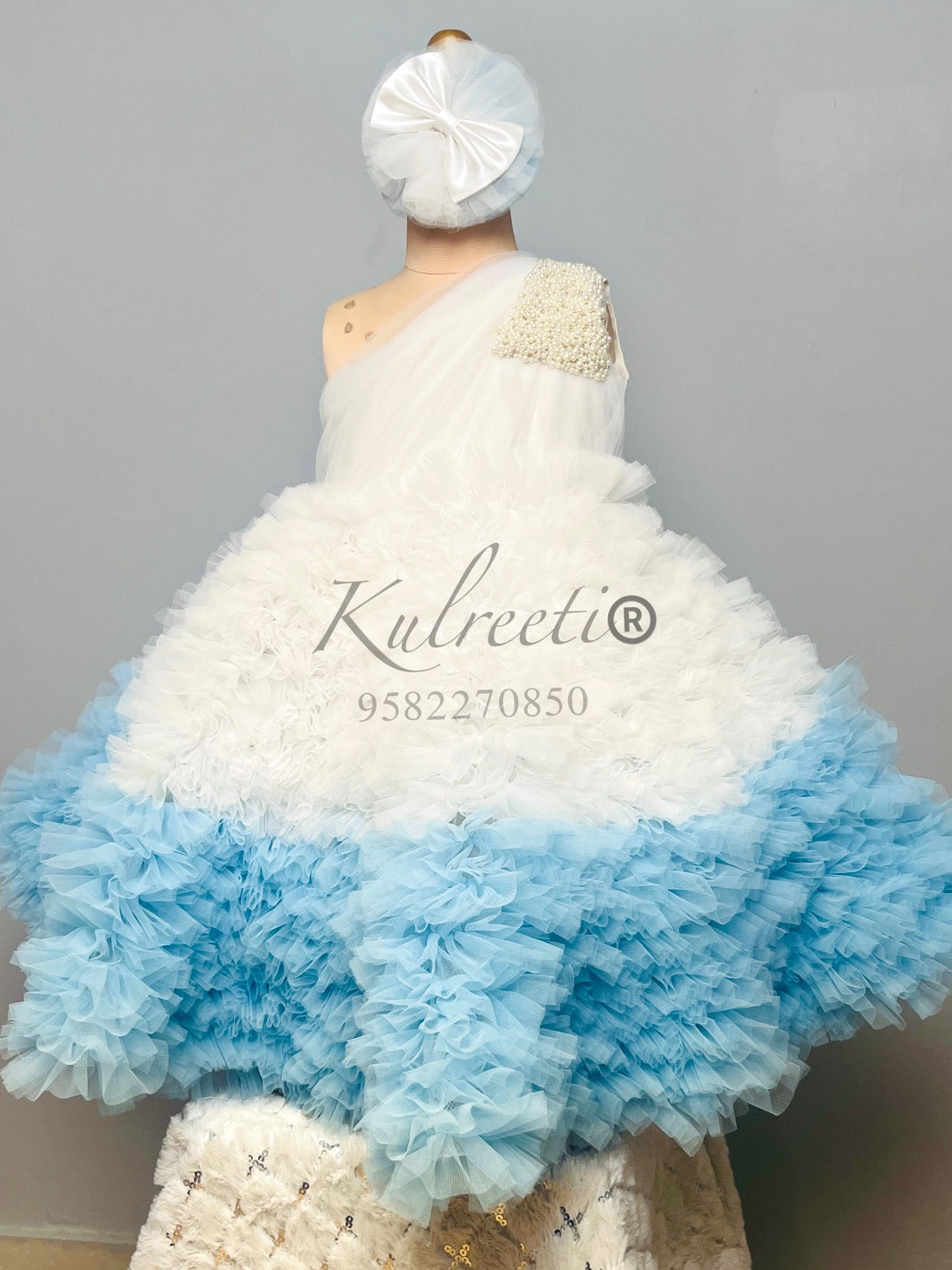 White & Blue frilly gown with pearl embroidery patch at shoulder