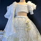 white sequin work blouse with net gota work  lehenga