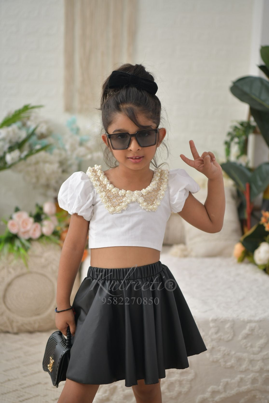 Casual White Cotton Top With Neck Detailing And Black Faux Leather Skirt