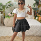 Casual White Cotton Top With Neck Detailing And Black Faux Leather Skirt