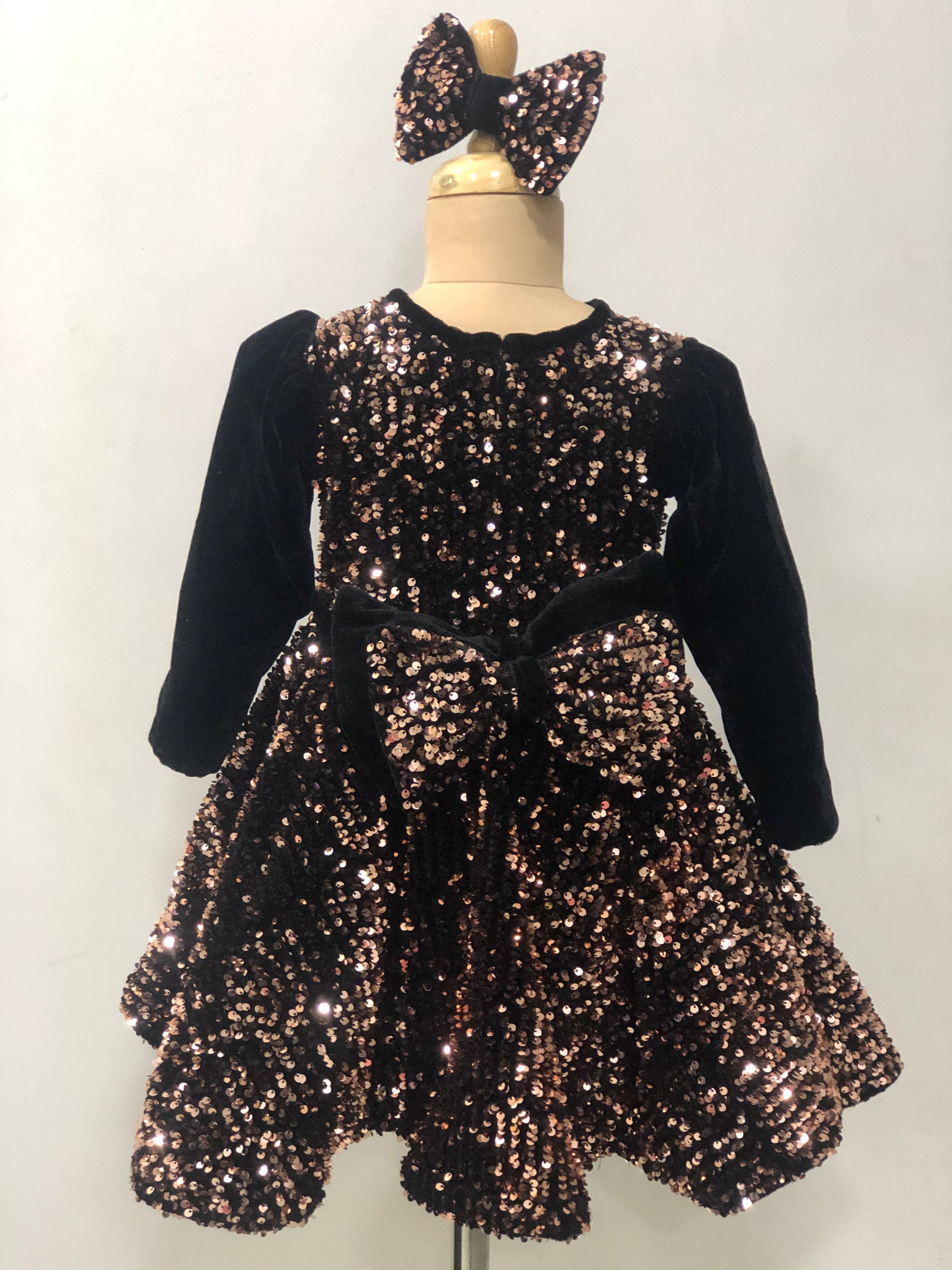 Rose Gold Velvet Sequin Frock With Black Velvet Bow Kulreeti Rose Gold Velvet Sequin Frock With Black Velvet Bow Kulreeti