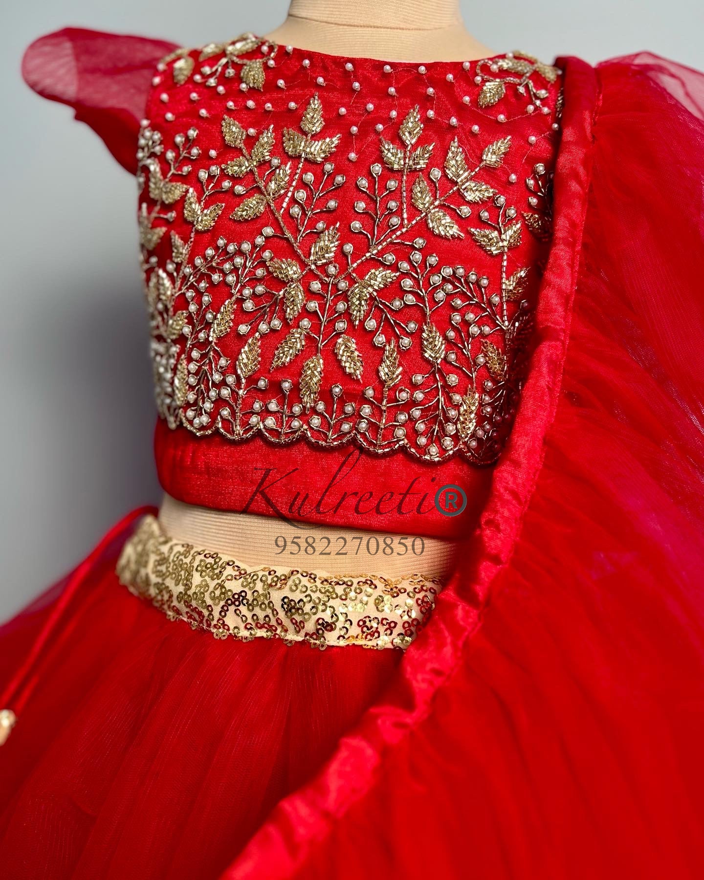 red hand embroidered blouse with unique style lehenga Kulreeti