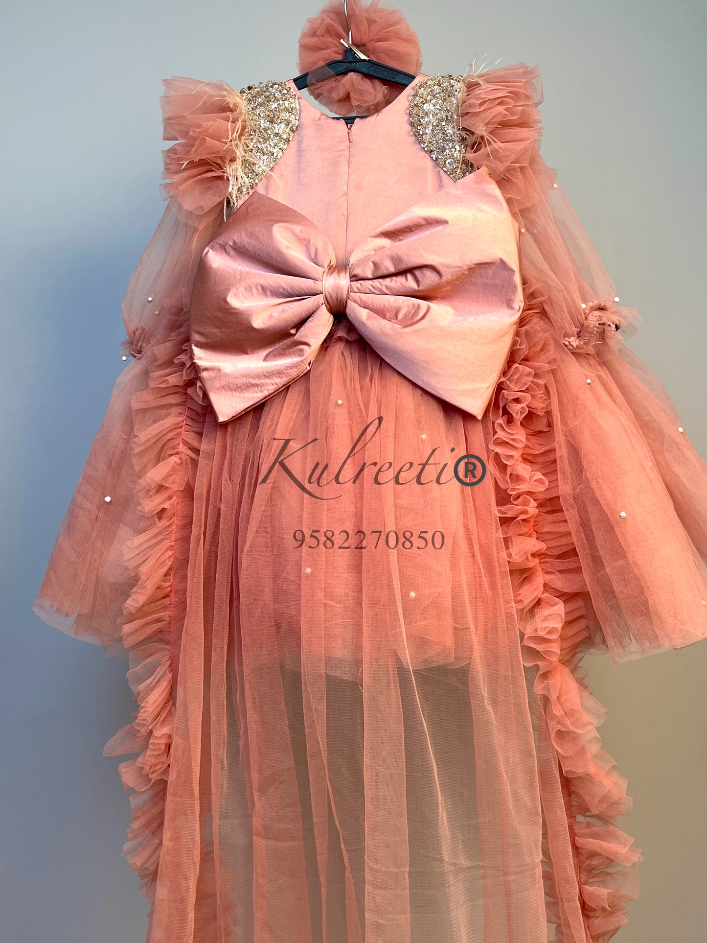 peach color pearl dress with unique embroidered  shoulders